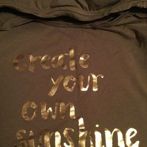 Graphic tee size medium in excellent used condition measured 21 inches across